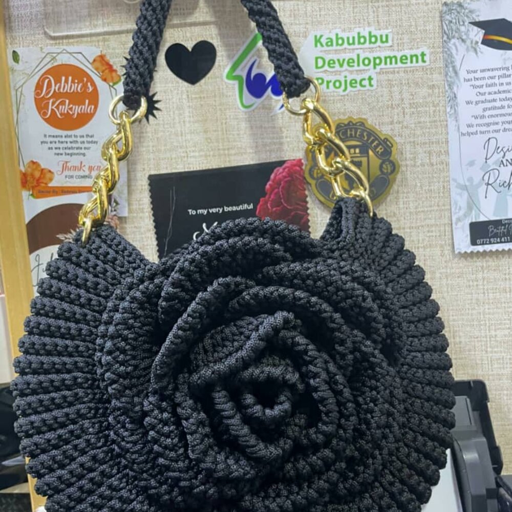Grey and silver textured crochet shoulder bag with chain handle and rose centrepiece
